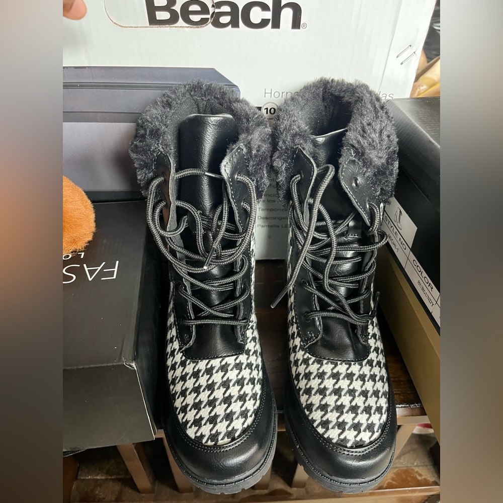 Black and white winter boots